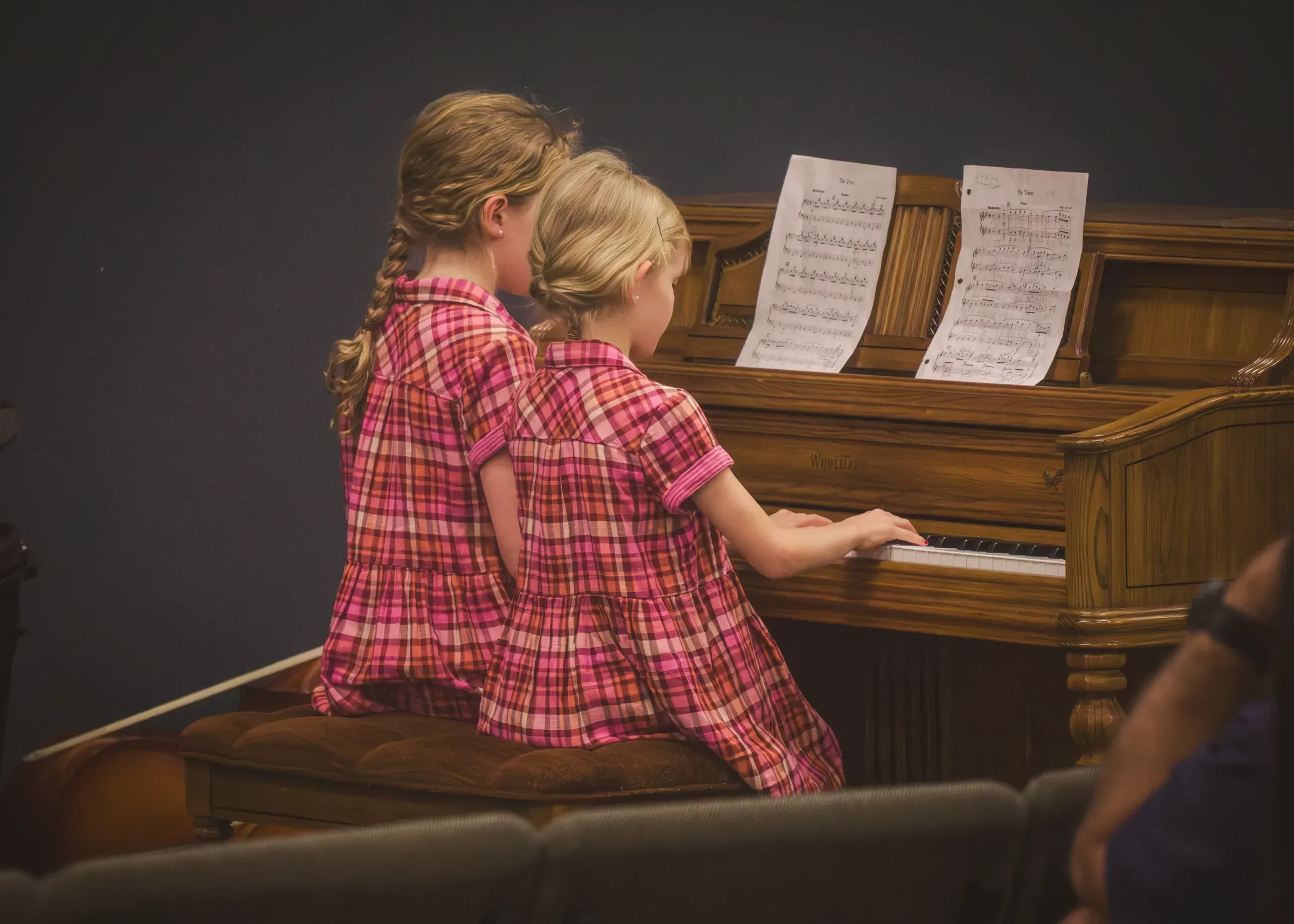 Sisters at piano